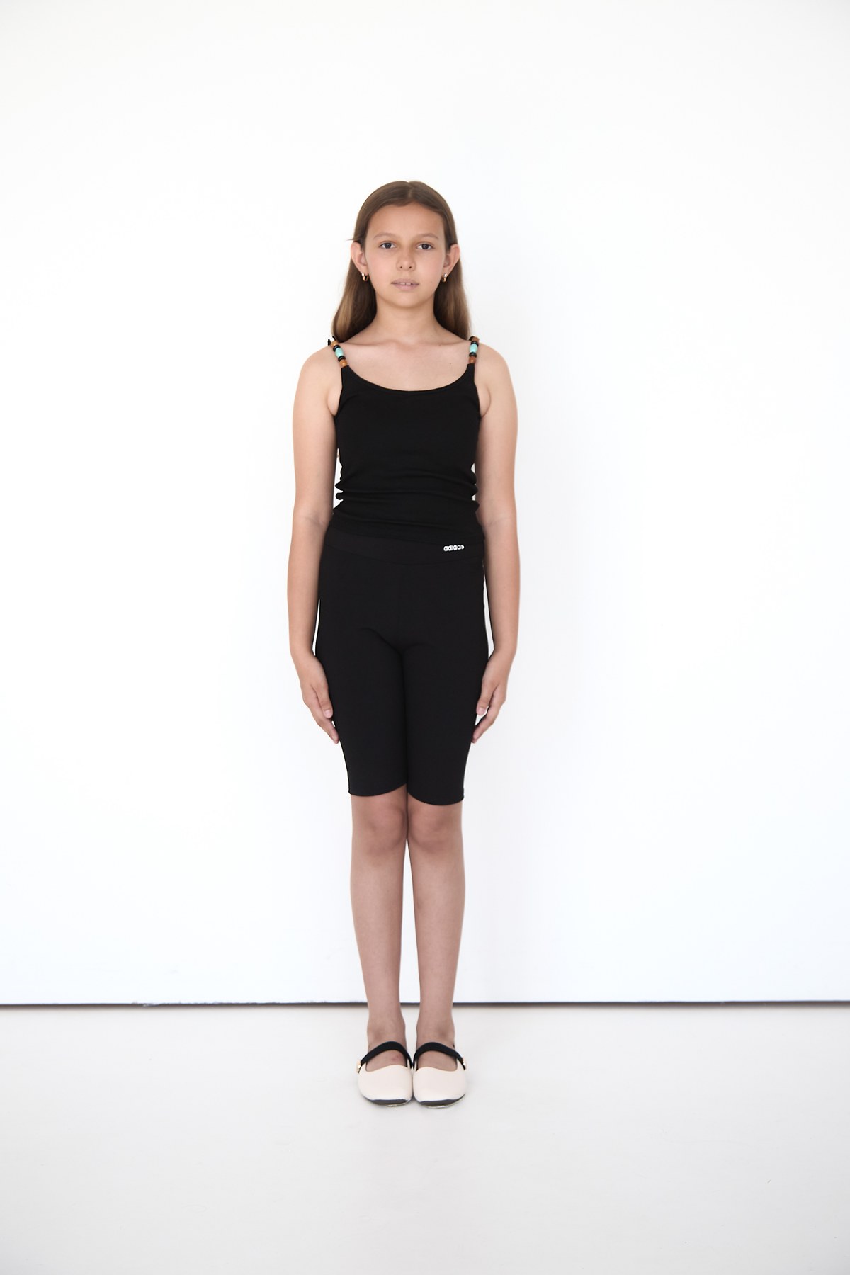 Front full-length digital in a fitted black outfit